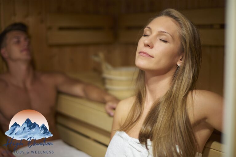 A woman and a man sitting in a sauna taking advantage of the sauna benefits.